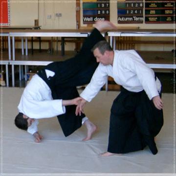 Partner practice on the mat.